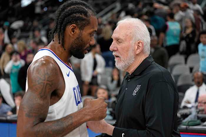 Nov 22, 2023; San Antonio, Texas, USA; San Antonio Spurs head coach Gregg Popovich talks with Los Angeles Clippers forward Kawhi Leonard (2) after a game at Frost Bank Center.